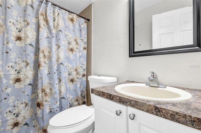 9900 Sweepstakes Ln Unit 1, Orlando, FL 32837 - bathroom featuring vanity, toilet, and a shower with curtain