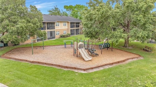 9900 Sweepstakes Ln Unit 1, Orlando, FL 32837 - communal playground featuring a yard