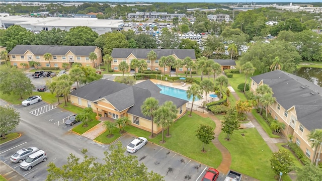 9900 Sweepstakes Ln Unit 1, Orlando, FL 32837 - drone / aerial view of a pool