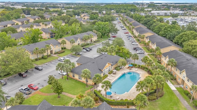9900 Sweepstakes Ln Unit 1, Orlando, FL 32837 - drone / aerial view of a pool
