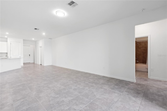 716 Daring Dr, Davenport, FL 33837 - unfurnished living room featuring recessed lighting, baseboards, and light tile patterned flooring
