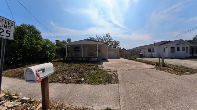 39 S College Ave, Maitland, FL 32751 - view of front facade featuring concrete driveway and covered porch