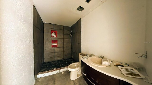 39 S College Ave, Maitland, FL 32751 - full bath featuring toilet, a shower stall, vanity, and concrete floors