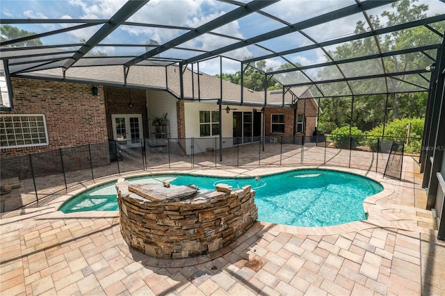 1550 Kevin Ln, Deland, FL 32724 - view of swimming pool featuring a patio area, a pool with connected hot tub, ceiling fan, and glass enclosure
