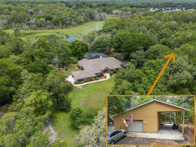 1550 Kevin Ln, Deland, FL 32724 - aerial view of property's location featuring a forest, property boundaries highlighted, and a nearby body of water