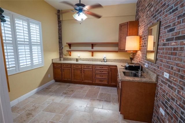 1550 Kevin Ln, Deland, FL 32724 - kitchen with a sink, brown cabinets, open shelves, stone tile flooring, and a ceiling fan