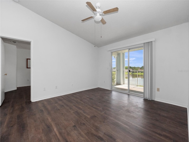 2533 Grassy Point Dr Unit 215, Lake Mary, FL 32746 - unfurnished room featuring wood finished floors, ceiling fan, vaulted ceiling, baseboards, and a water view