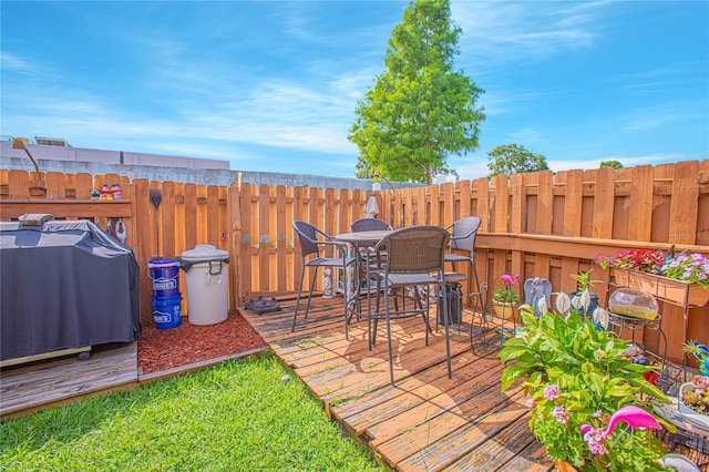4545 Southfield Ave, Orlando, FL 32812 - wooden terrace with a fenced backyard and grilling area