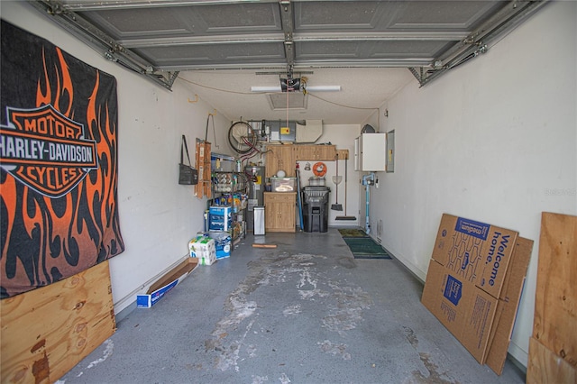 4545 Southfield Ave, Orlando, FL 32812 - garage featuring a garage door opener and water heater