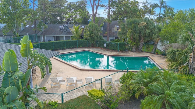 4545 Southfield Ave, Orlando, FL 32812 - community pool with a fenced backyard and a patio area