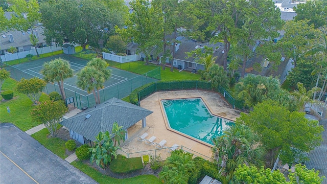 4545 Southfield Ave, Orlando, FL 32812 - community pool featuring a fenced backyard