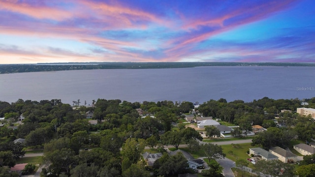 328 E Minnehaha Ave, Clermont, FL 34711 - aerial view at dusk of a water view and a residential view