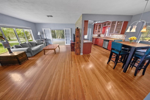 328 E Minnehaha Ave, Clermont, FL 34711 - living area featuring light wood finished floors and a ceiling fan