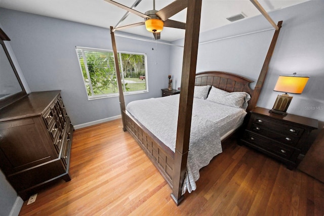 328 E Minnehaha Ave, Clermont, FL 34711 - bedroom featuring wood finished floors, baseboards, and ceiling fan