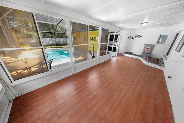 328 E Minnehaha Ave, Clermont, FL 34711 - unfurnished sunroom with a wood stove