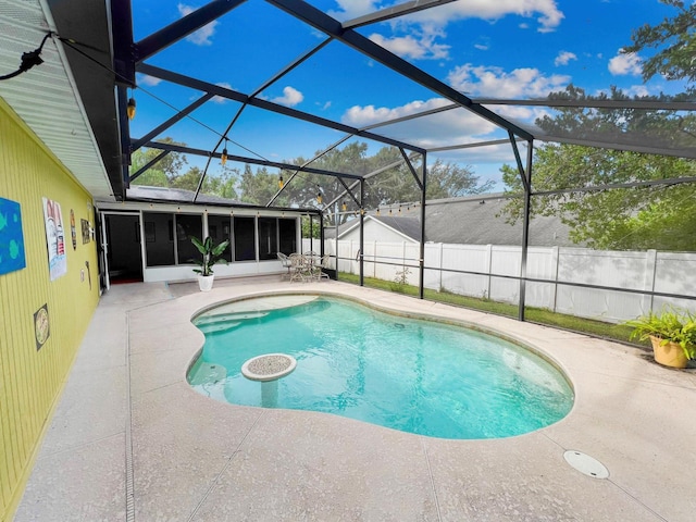 328 E Minnehaha Ave, Clermont, FL 34711 - view of swimming pool featuring a patio area, a sunroom, and a lanai