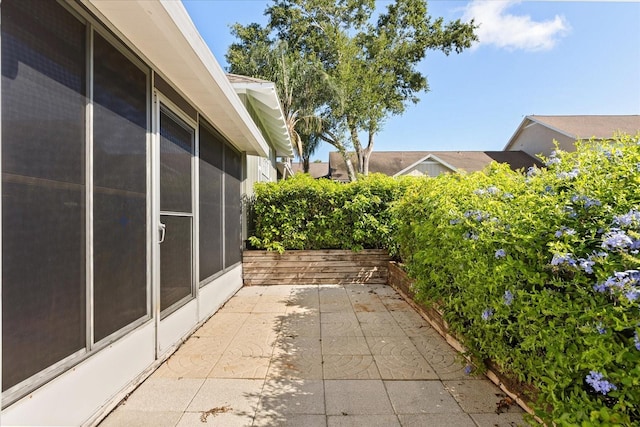 1126 Villa Ln Unit 91, Apopka, FL 32712 - view of patio featuring a sunroom