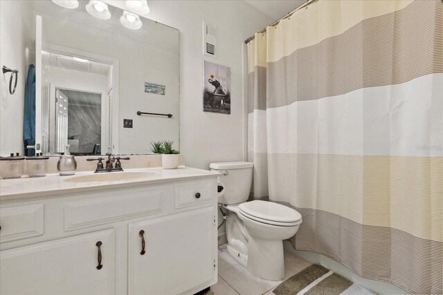 1126 Villa Ln Unit 91, Apopka, FL 32712 - full bath featuring tile patterned floors, vanity, and a shower with curtain
