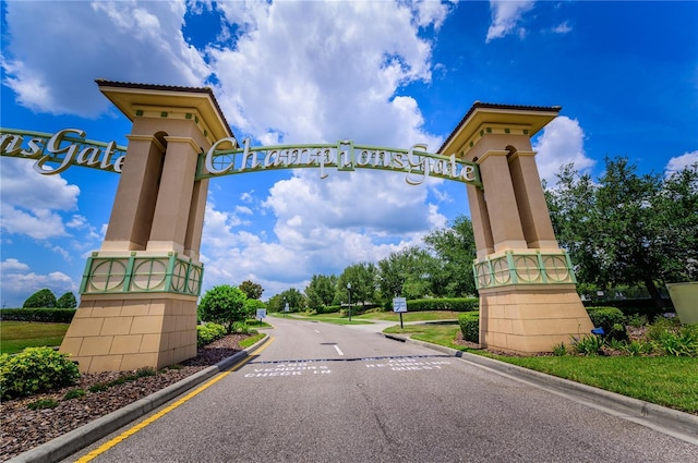 9014 Stinger Dr, Davenport, FL 33896 - view of asphalt street featuring curbs
