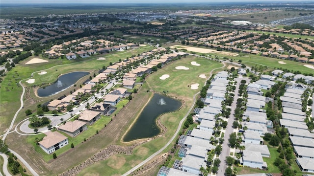 9014 Stinger Dr, Davenport, FL 33896 - aerial view of property and surrounding area featuring a nearby body of water, nearby suburban area, and a golf course