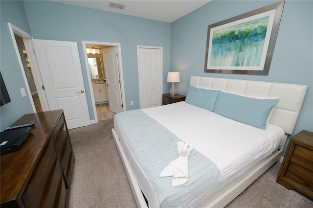 9014 Stinger Dr, Davenport, FL 33896 - carpeted bedroom with a closet and connected bathroom