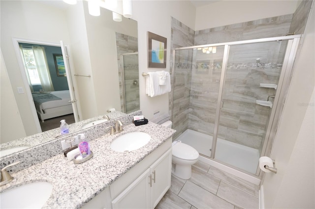 9014 Stinger Dr, Davenport, FL 33896 - bathroom featuring double vanity, ensuite bathroom, and a stall shower