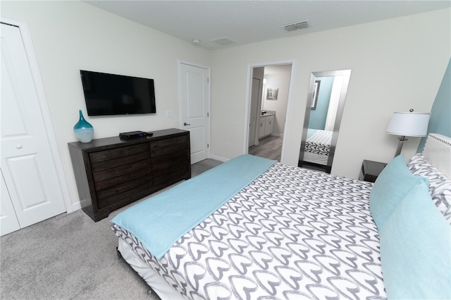 9014 Stinger Dr, Davenport, FL 33896 - bedroom featuring carpet floors and connected bathroom