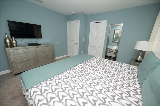 9014 Stinger Dr, Davenport, FL 33896 - carpeted bedroom with baseboards and a closet