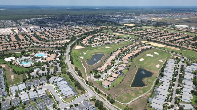 9014 Stinger Dr, Davenport, FL 33896 - aerial view of property's location with a large body of water, nearby suburban area, and a local golf course