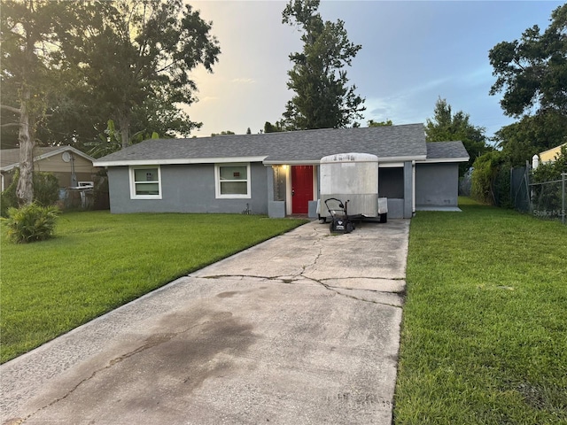 2847 W Harwood St Unit 0, Orlando, FL 32805 - ranch-style home featuring driveway and stucco siding
