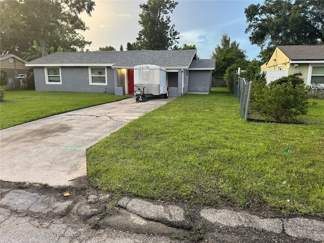 2847 W Harwood St Unit 0, Orlando, FL 32805 - ranch-style house with concrete driveway and stucco siding