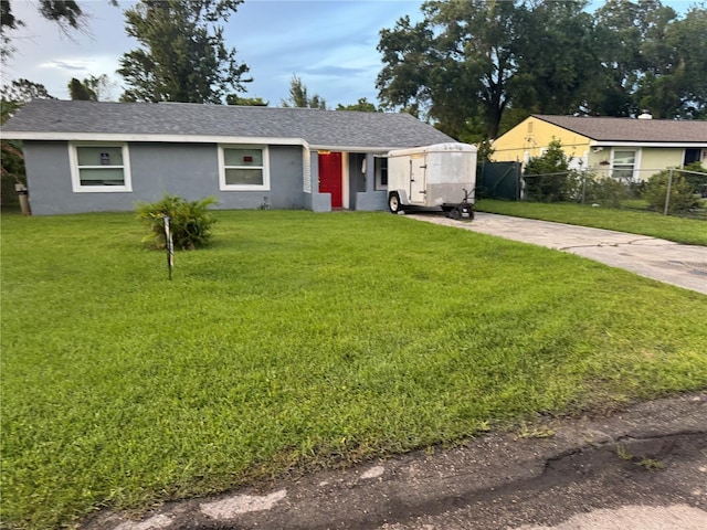 2847 W Harwood St Unit 0, Orlando, FL 32805 - ranch-style house featuring stucco siding and driveway