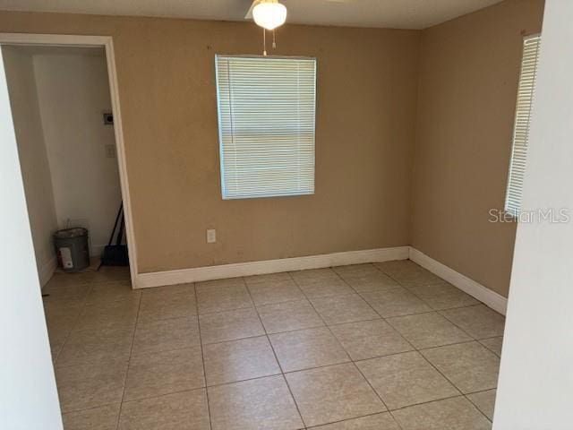 2847 W Harwood St Unit 0, Orlando, FL 32805 - spare room with light tile patterned floors