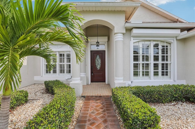 970 Sabal Grove Dr, Rockledge, FL 32955 - doorway to property with stucco siding