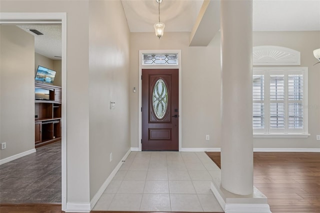 970 Sabal Grove Dr, Rockledge, FL 32955 - entryway with baseboards and decorative columns