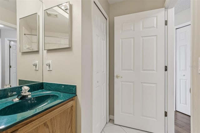 970 Sabal Grove Dr, Rockledge, FL 32955 - bathroom featuring vanity and a closet