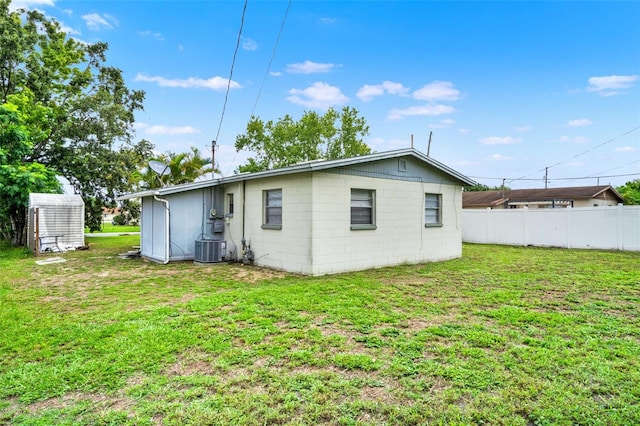 1170 E Bay St, Winter Garden, FL 34787 - rear view of property featuring cooling unit and concrete block siding