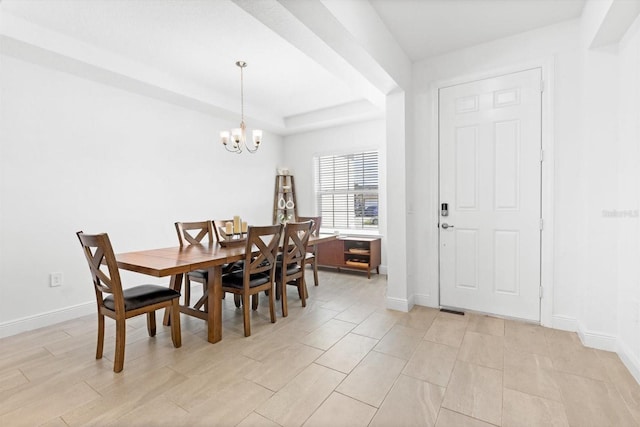 652 SW Mccoy Ave, Port St Lucie, FL 34953 - dining space with a chandelier and baseboards