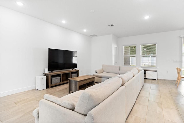 652 SW Mccoy Ave, Port St Lucie, FL 34953 - living area with recessed lighting and baseboards