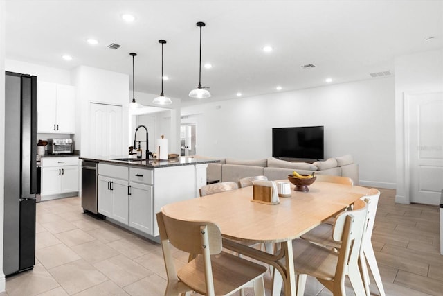 652 SW Mccoy Ave, Port St Lucie, FL 34953 - dining space with recessed lighting