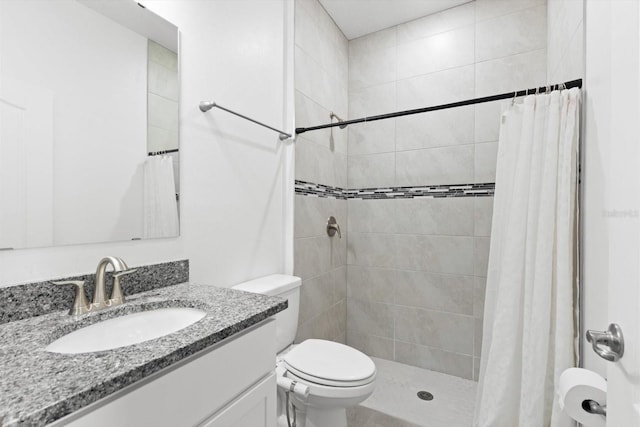 652 SW Mccoy Ave, Port St Lucie, FL 34953 - bathroom with toilet, vanity, and tiled shower