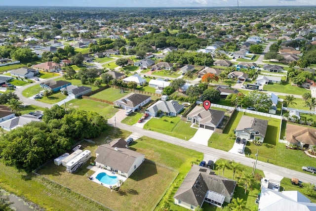 652 SW Mccoy Ave, Port St Lucie, FL 34953 - view of property location featuring a pool area and nearby suburban area