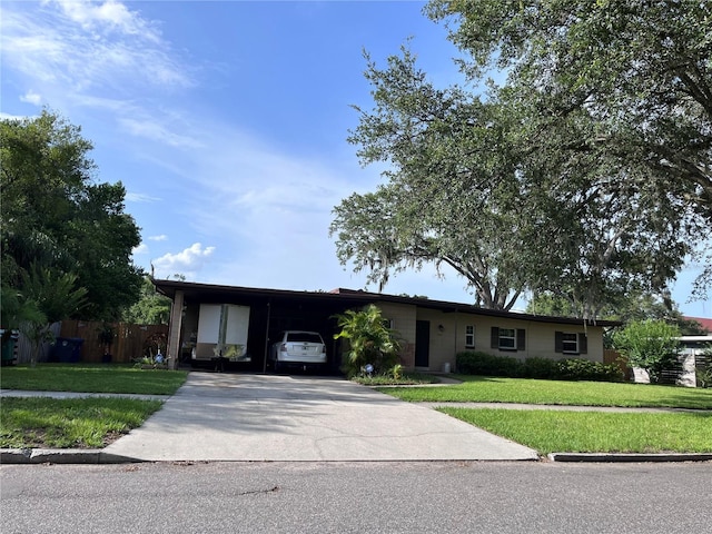 1901 Loch Berry Rd, Winter Park, FL 32792 - ranch-style house featuring driveway and a carport