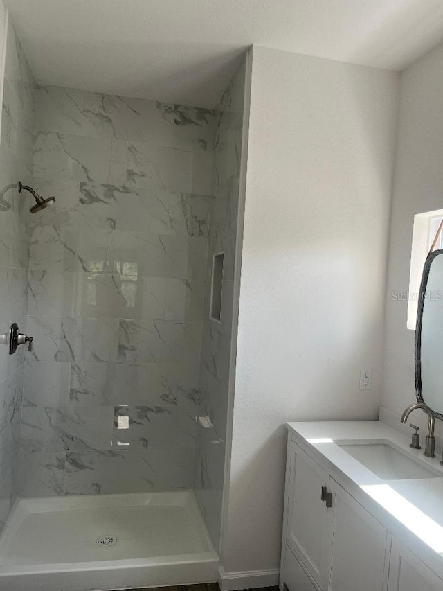 611 Amazon Pl, Kissimmee, FL 34759 - bathroom with vanity and a marble finish shower