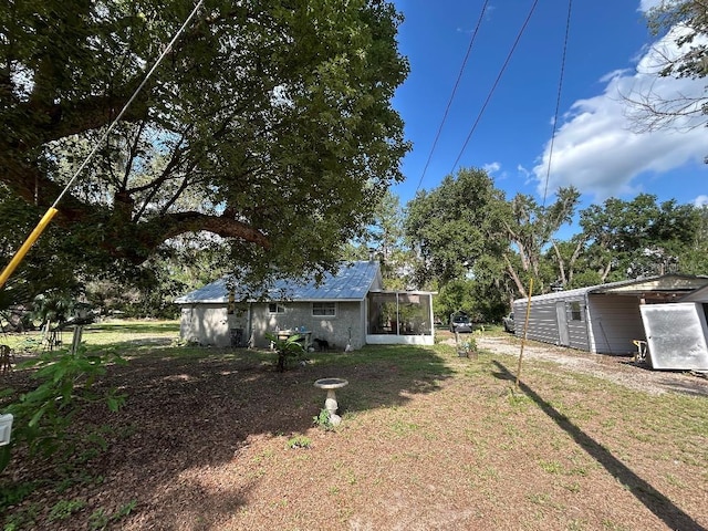 2847 Crk 756, Webster, FL 33597 - view of green lawn featuring a sunroom