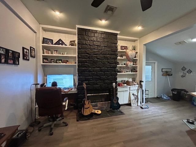 2847 Crk 756, Webster, FL 33597 - office space featuring ceiling fan, built in features, wood finished floors, and vaulted ceiling