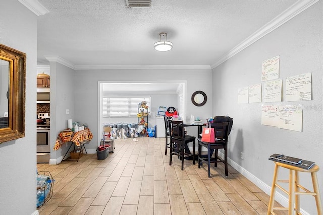 1877 Attucks Ave, Orlando, FL 32811 - dining room featuring light wood-style flooring, crown molding, baseboards, an office area, and a textured ceiling