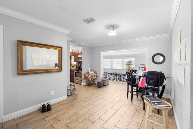 1877 Attucks Ave, Orlando, FL 32811 - living area featuring ornamental molding, light wood finished floors, and baseboards