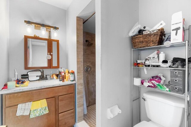 1877 Attucks Ave, Orlando, FL 32811 - bathroom featuring a stall shower, vanity, and toilet