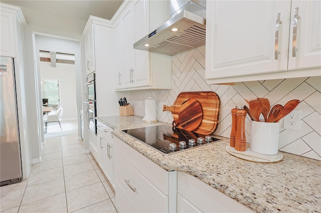9257 Outlook Rock Trl, Windermere, FL 34786 - kitchen featuring exhaust hood, appliances with stainless steel finishes, backsplash, and white cabinetry